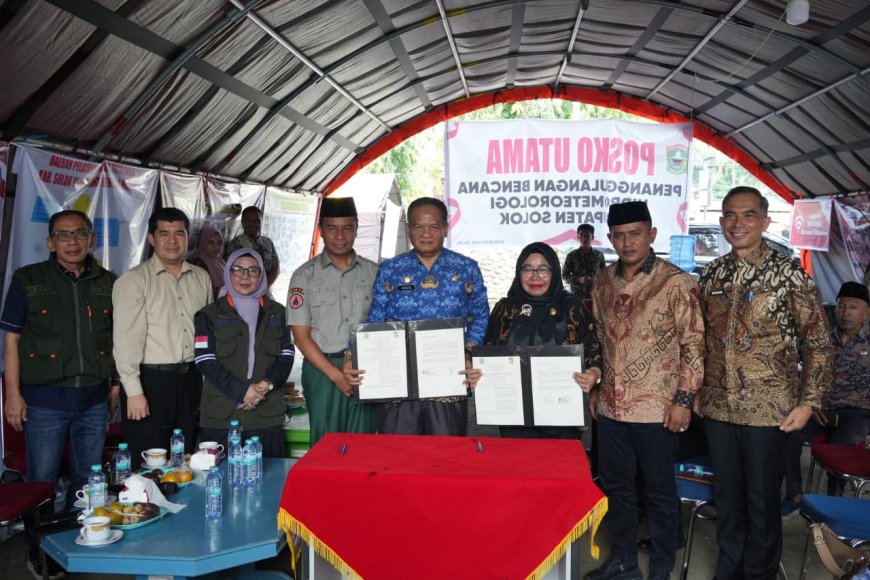 Pemkab Kampar–Pemkab Solok Teken MoU Penyediaan Beras Bansos untuk Disabilitas dan Lansia