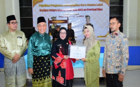Wabup Kampar Dorong Guru Perkuat Muatan Lokal Budaya Melayu